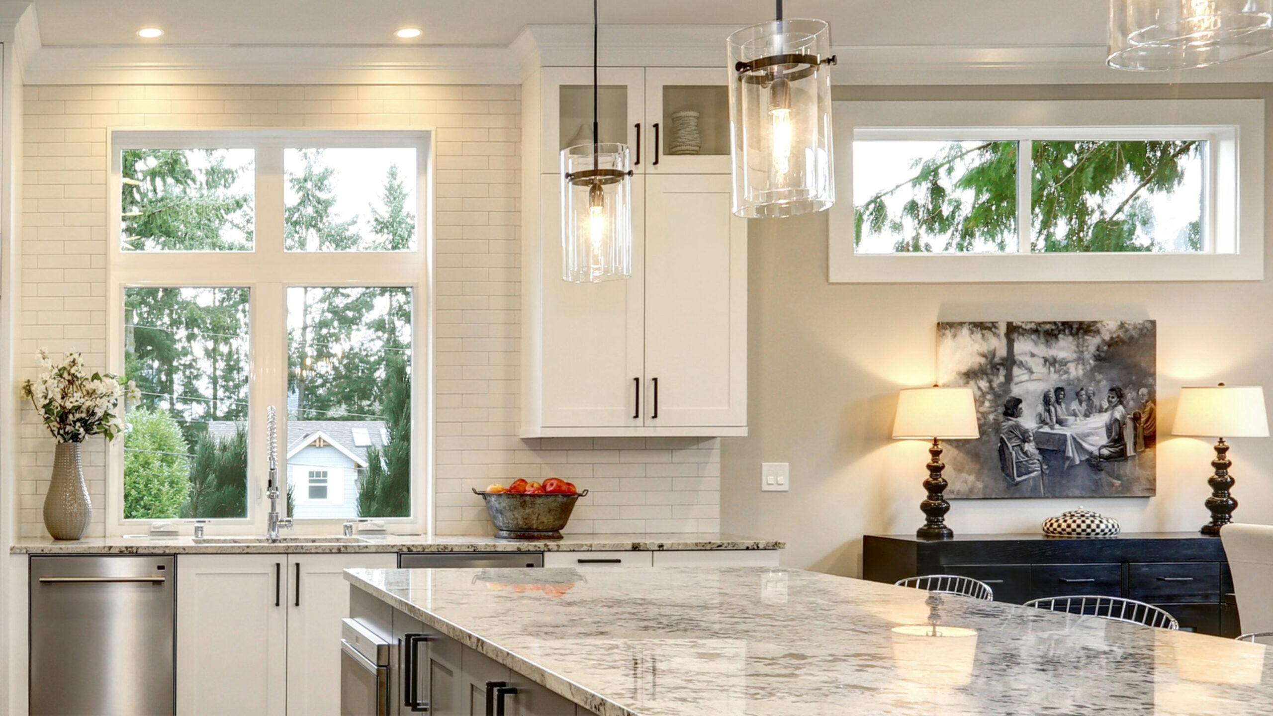 white trim windows in a home with white walls and a kitchen island