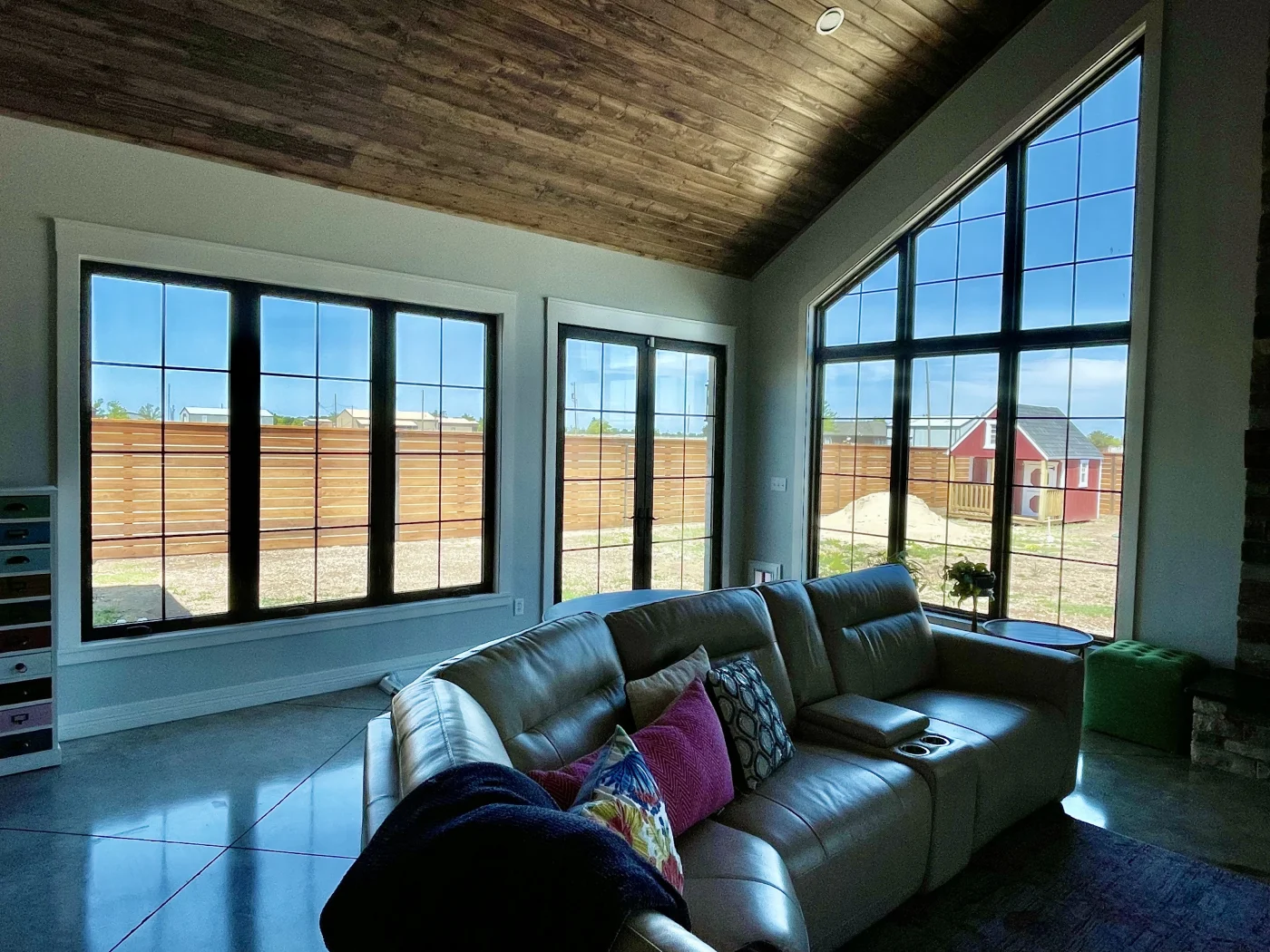 Black Marvin infinity fiberglass windows and french door installed by Amarillo Solar Shade Co.