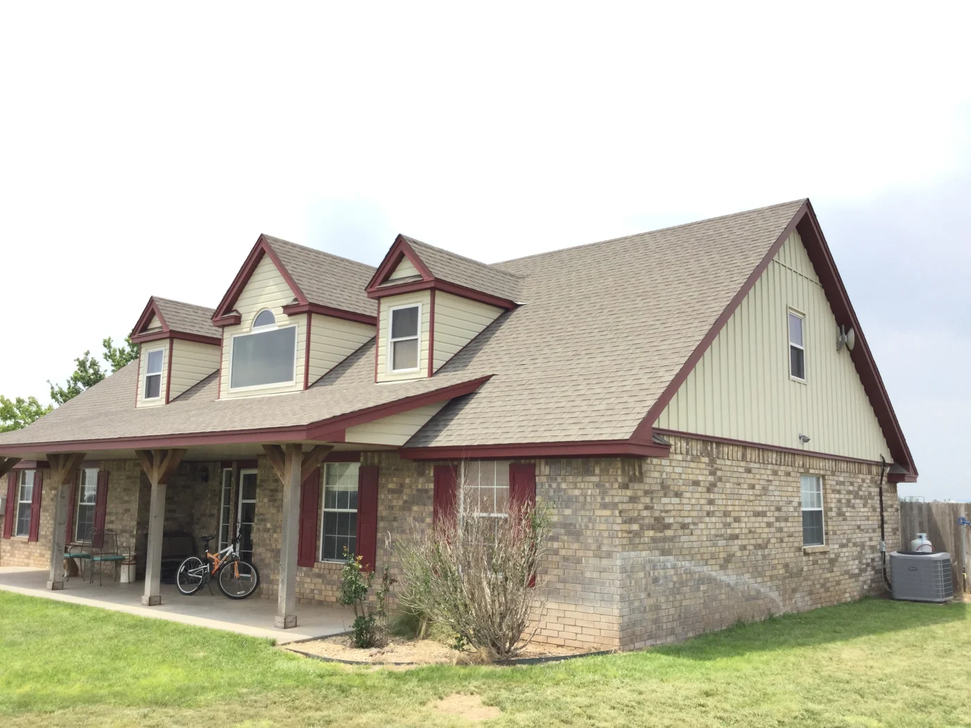 Board & Batten steel siding installed by Amarillo Solar Shade Co. for a home in the Texas Panhandle.