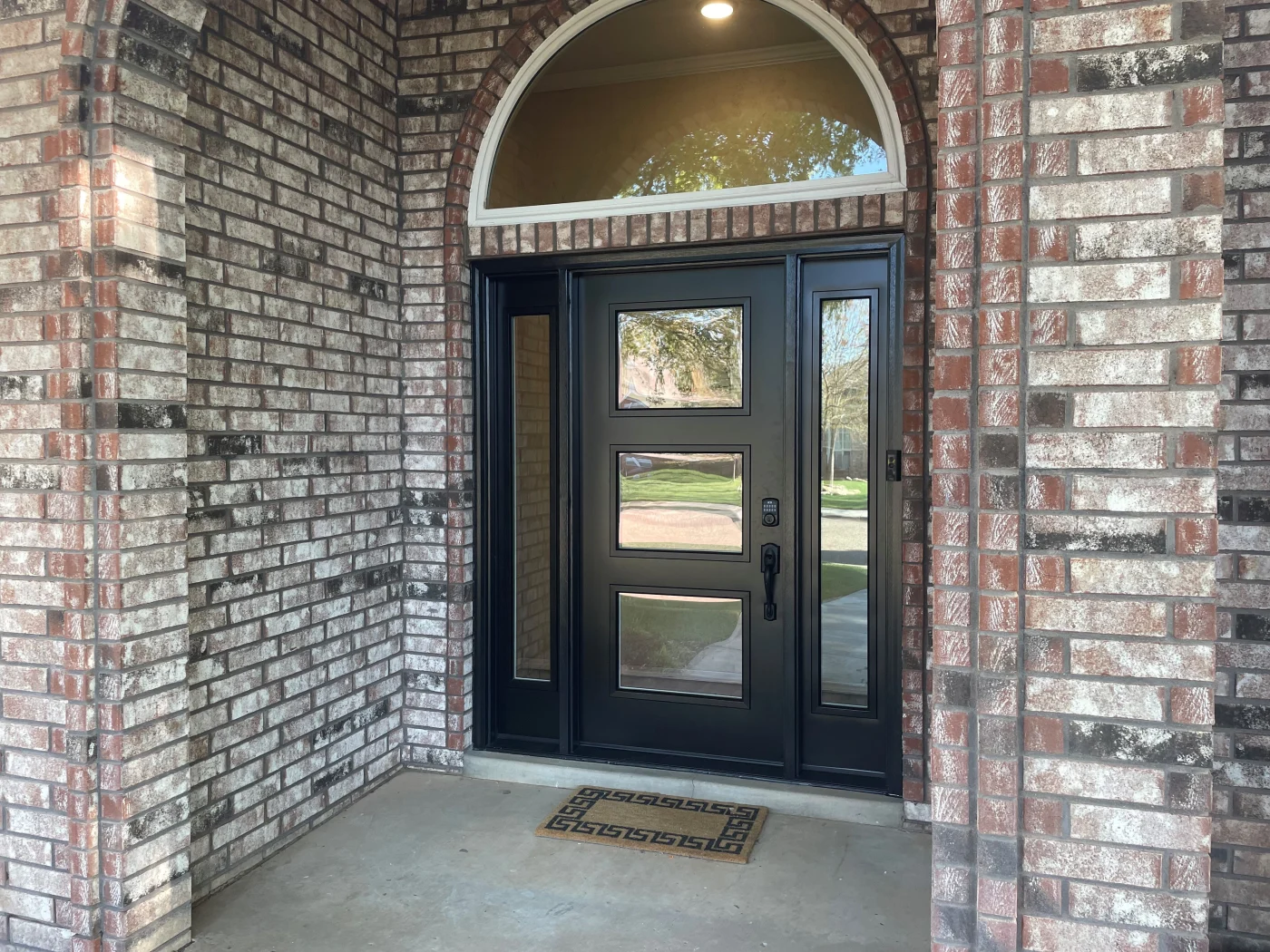 Steel entry door installed by Amarillo Solar Shade Co.