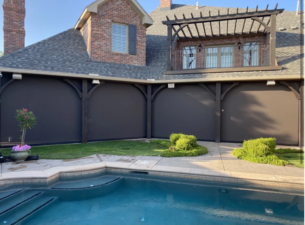 Remote controlled retractable patio blinds installed by Amarillo Solar Shade Co