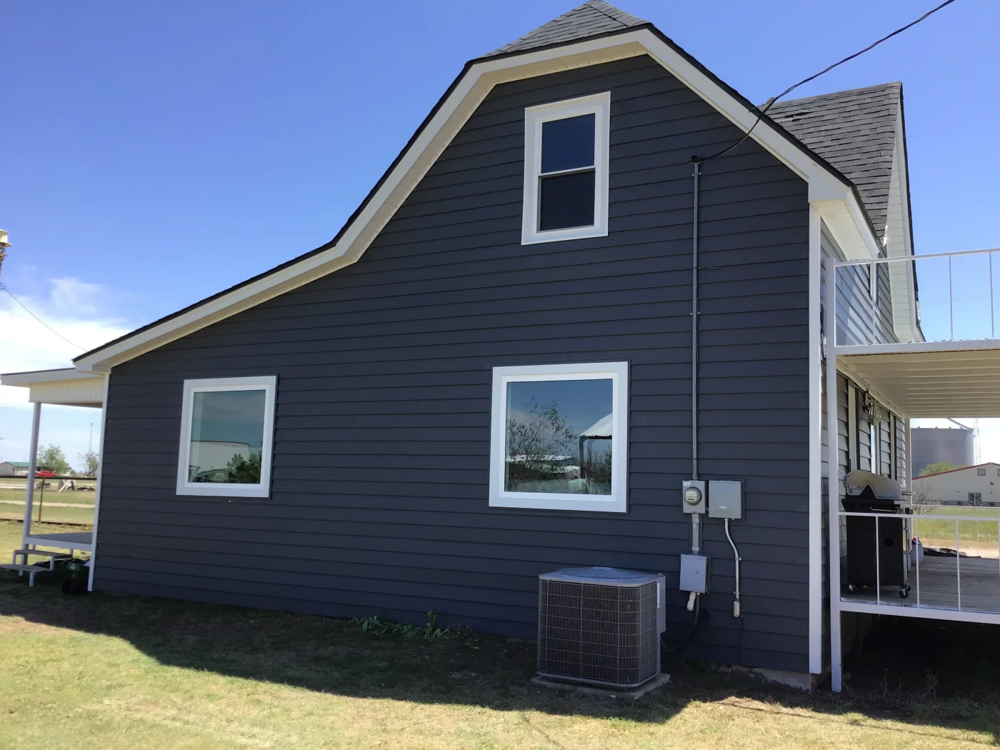 Vinyl siding installed by Amarillo Solar Shade Co. for a home in the Texas Panhandle.